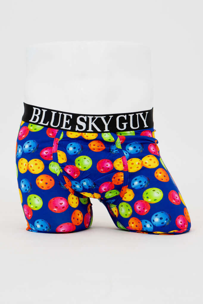 Front view of men's boxer briefs with colorful pickleball print and BLUE SKY GUY waistband