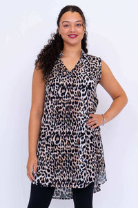 Model wearing sleeveless leopard print tunic with high-low hemline, front view