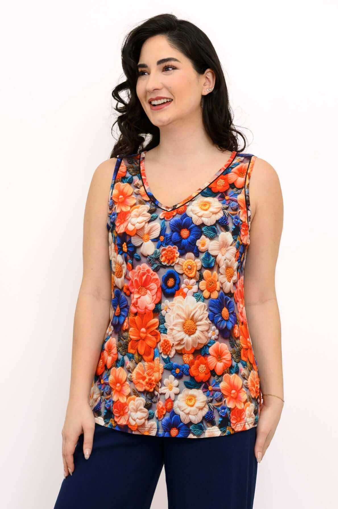Woman wearing a vibrant floral bamboo tank with V-neck, front view