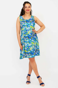 Front view of model wearing Sara blue floral sleeveless summer dress