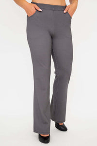 Front view of Sasha bootcut pants with hands in pockets