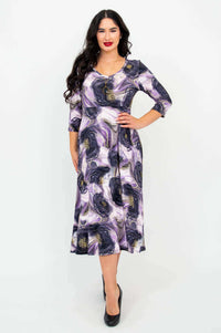 Front view of a woman wearing the Soul Dress in Amethyst Marble print