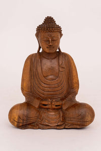 Front view of a hand-carved Suar wood meditating Buddha statue