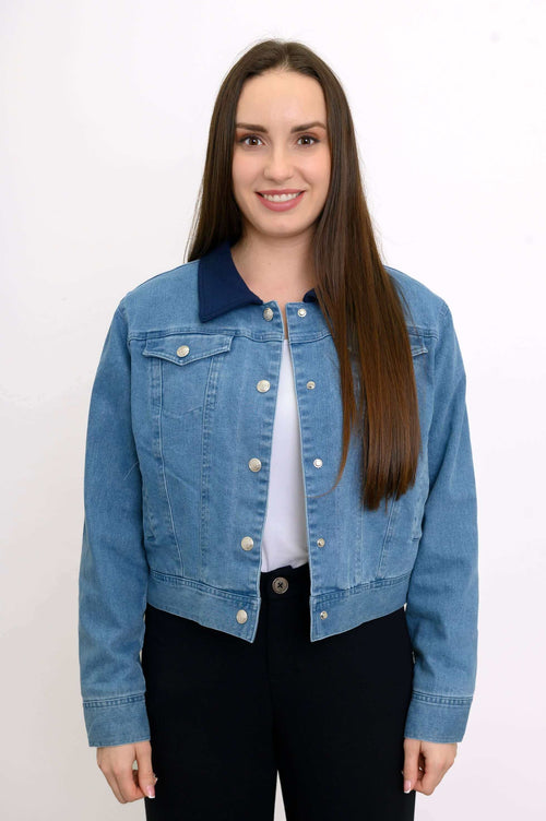 Front view of a woman wearing The Gerry classic jean jacket with navy collar