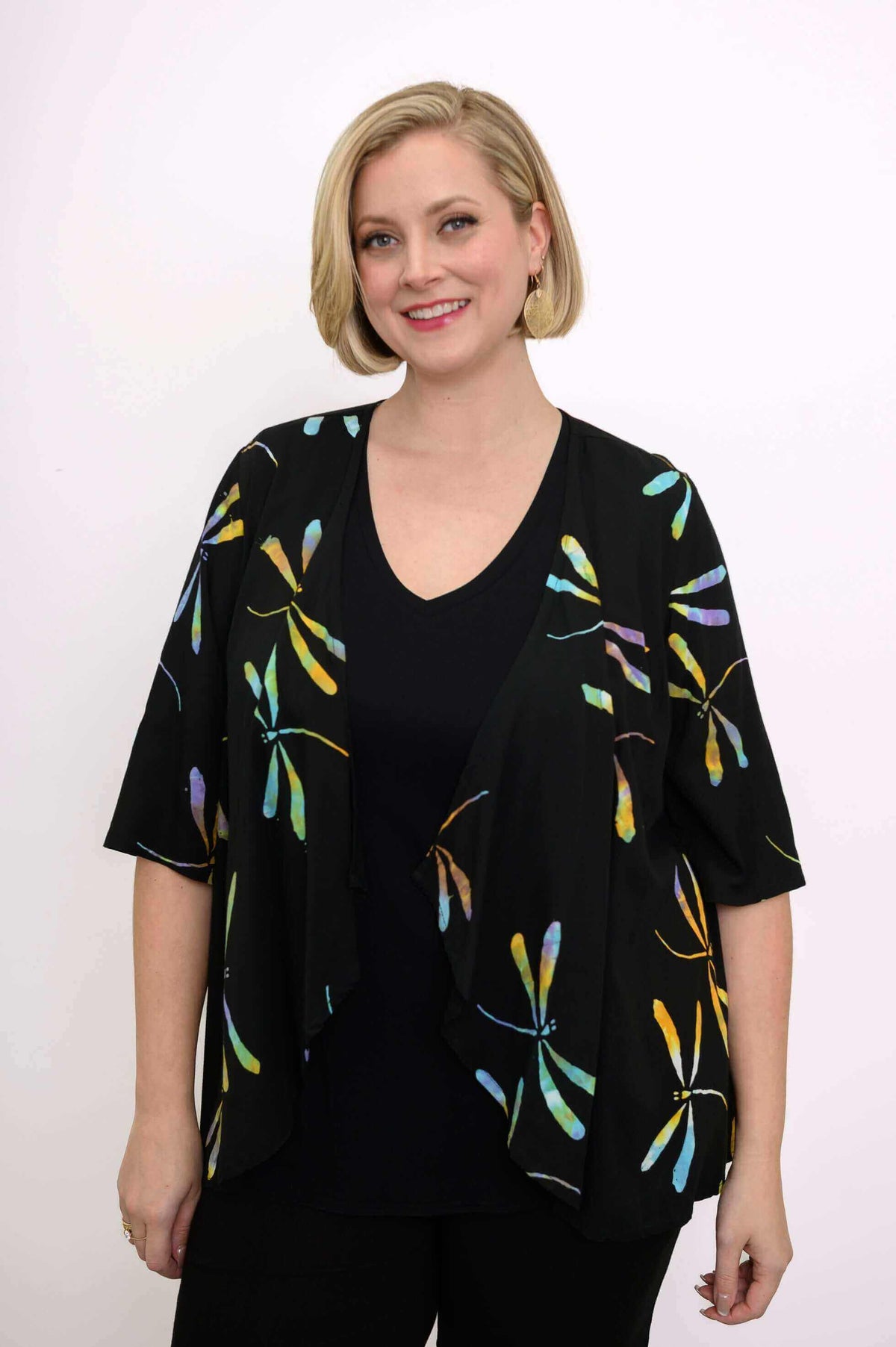 Front view of woman wearing Toucan Dragonfly Jacket with black top