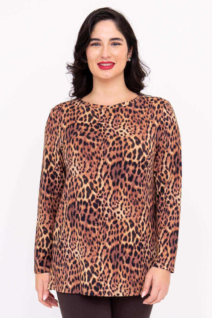 Front view of a woman wearing a long sleeve leopard print top