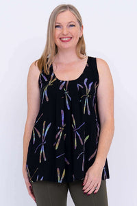 Front view of woman wearing black sleeveless tank top with dragonfly print and pleats