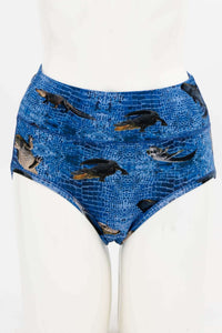 Front view of blue high-waisted alligator print women's brief on mannequin