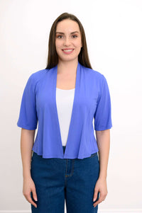 Front view of model wearing a blue cropped short sleeve open-front jacket