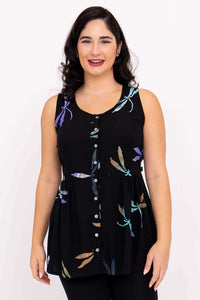 Front view of a woman wearing a black batik button tank with colorful dragonfly print