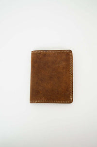 Front view of a brown buffalo leather bi-fold wallet with contrast stitching