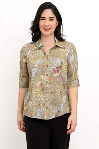 Front view of woman wearing a floral bamboo linen blouse with elbow-length sleeves