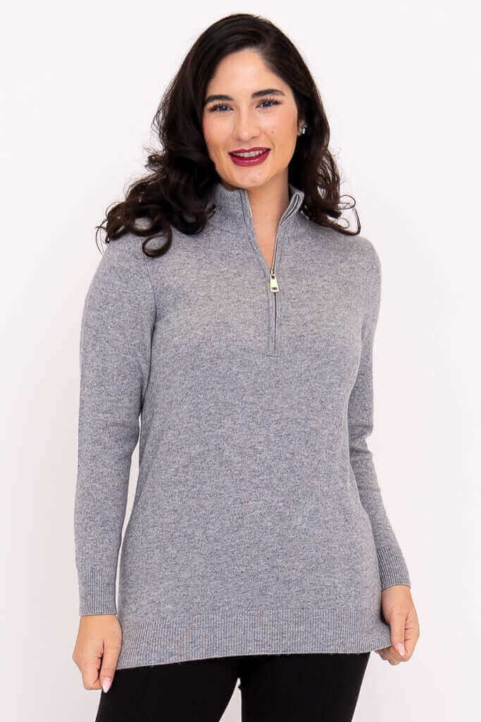 Front view of woman wearing a grey half-zip cashmere wool sweater