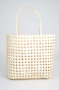 Front view of hand woven rattan basket with double handles