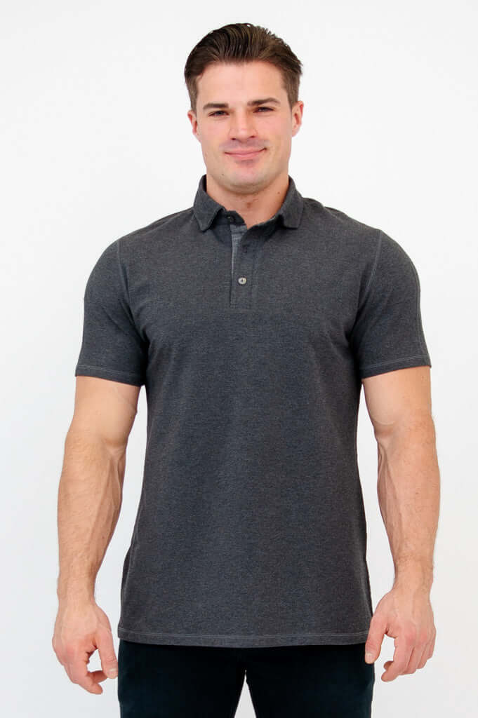 Front view of man wearing a dark grey bamboo polo shirt