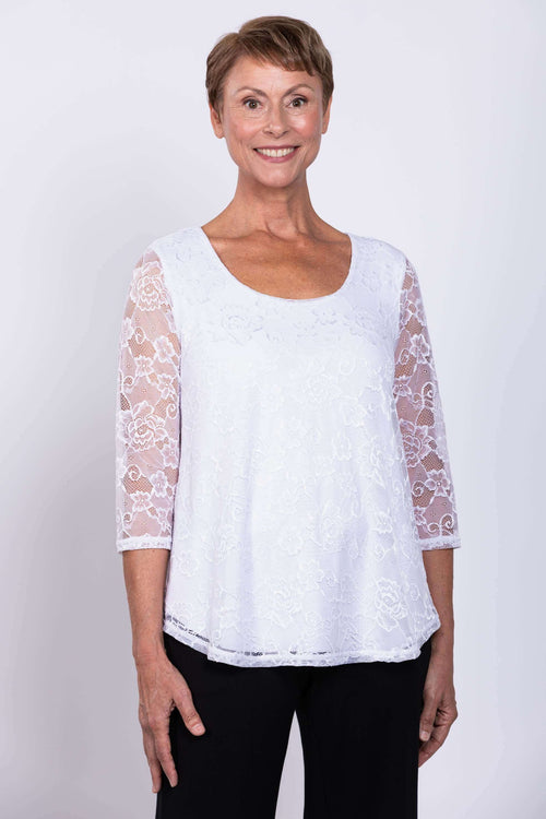 Front view of model wearing white lace Ellen Top with 3/4 sleeves