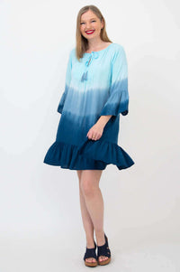 Front view of another model in the Ellie Dress, showing ombre blue color and flowy fit