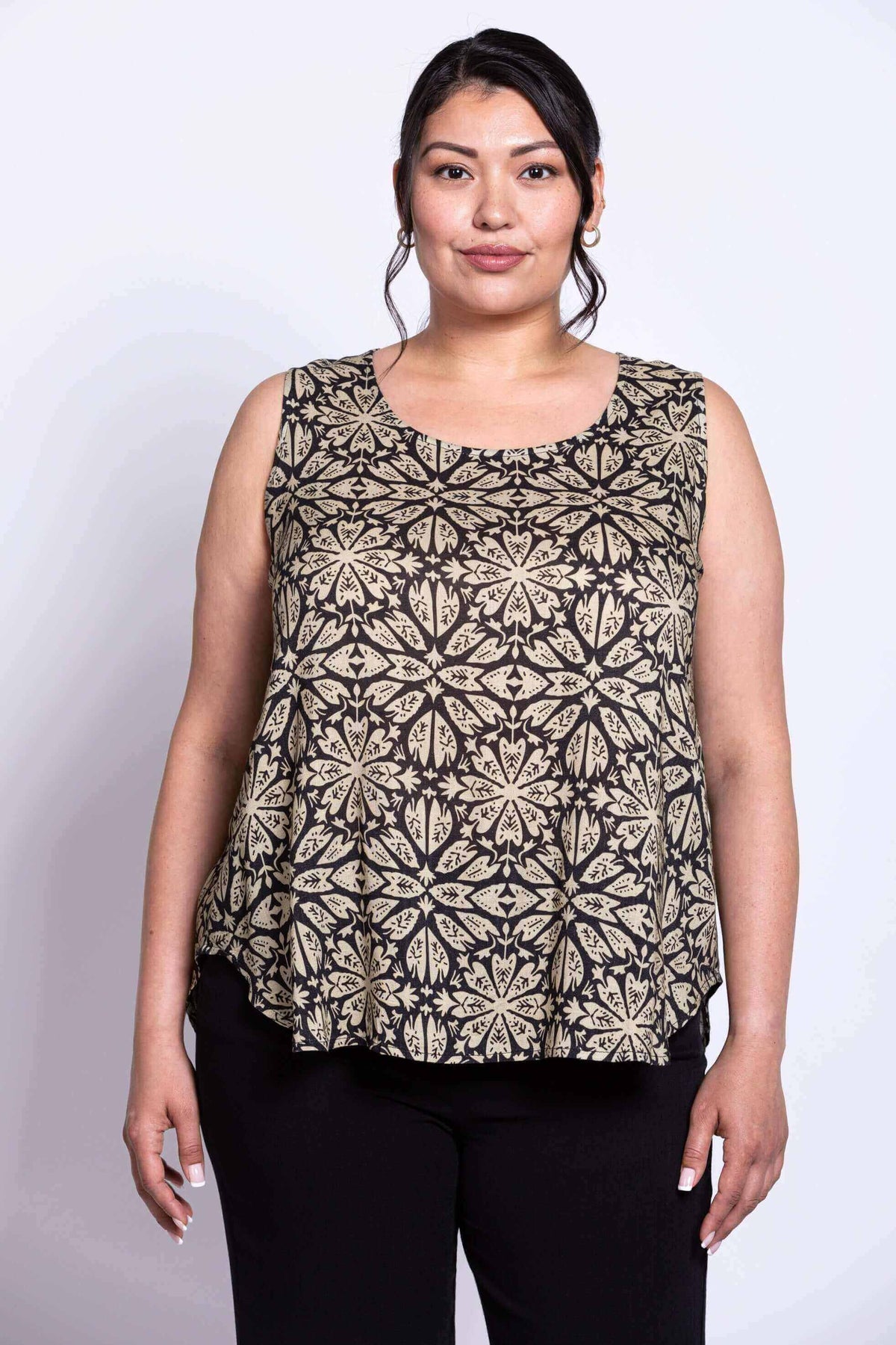 Front view of model wearing black floral sleeveless linen-bamboo tank top