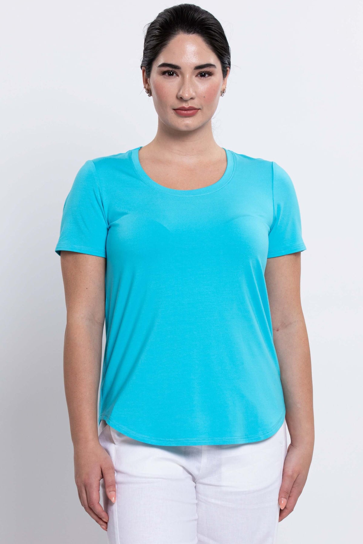 Front view of model wearing bright aqua blue short sleeve bamboo tee