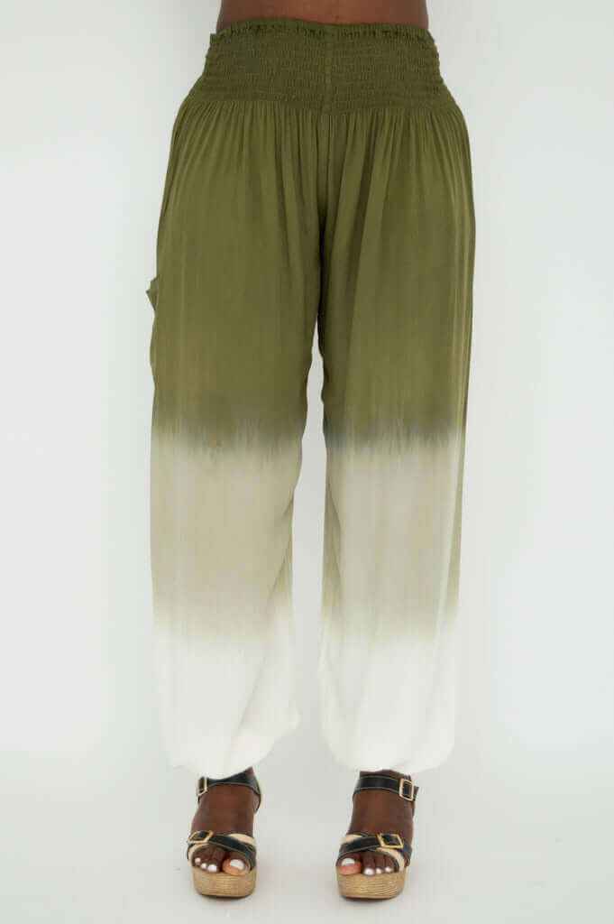 Front view of olive ombre boho pants featuring wide legs and elastic waist