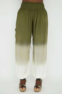 Front view of olive ombre boho pants featuring wide legs and elastic waist
