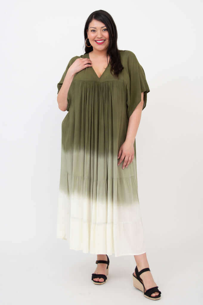 Front view of woman wearing olive ombre tiered maxi dress with V-neck and short sleeves
