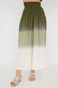 Front view of olive ombre wide leg pants with smocked waistband