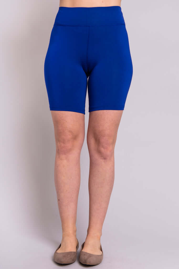 Front view of model in royal blue bamboo shorts with seamless finish