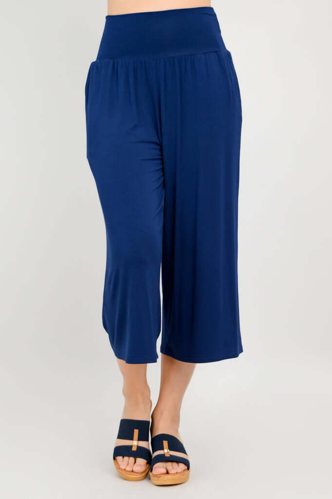 Front view of royal blue wide-leg bamboo capri pants with flat waistband