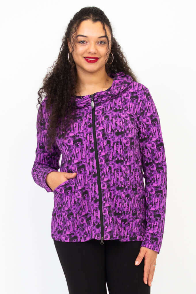 Front view of woman wearing a violet abstract print fitted hoodie with zipper