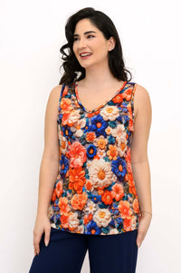 Woman wearing a sleeveless floral bamboo tank top with a V-neck, front view
