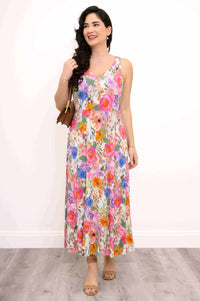 Front view of woman wearing a sleeveless floral maxi dress with a fitted bodice