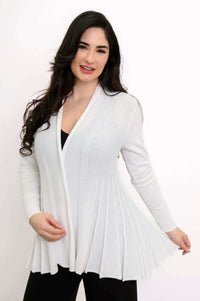Front view of woman wearing white Karen Cardigan with drape-front and pleats