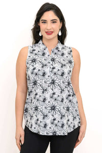 Front view of woman wearing sleeveless floral quarter-zip tank top