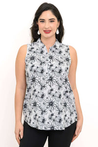Front view of woman wearing sleeveless floral zip tank top