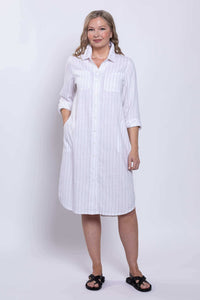 Front view of a model wearing white striped viscose linen duster dress with pockets