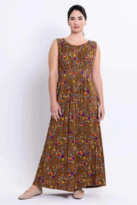 Full-length front view of the brown sleeveless floral maxi dress with pleat accents