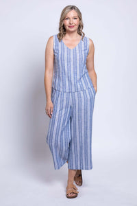 Full body front view of woman in blue and white striped cropped tank and matching pants