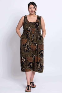 Full body front view of model in animal print wide leg cropped jumpsuit