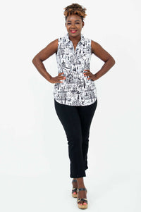 Full body front view of model in Hula quarter zip tank and black pants