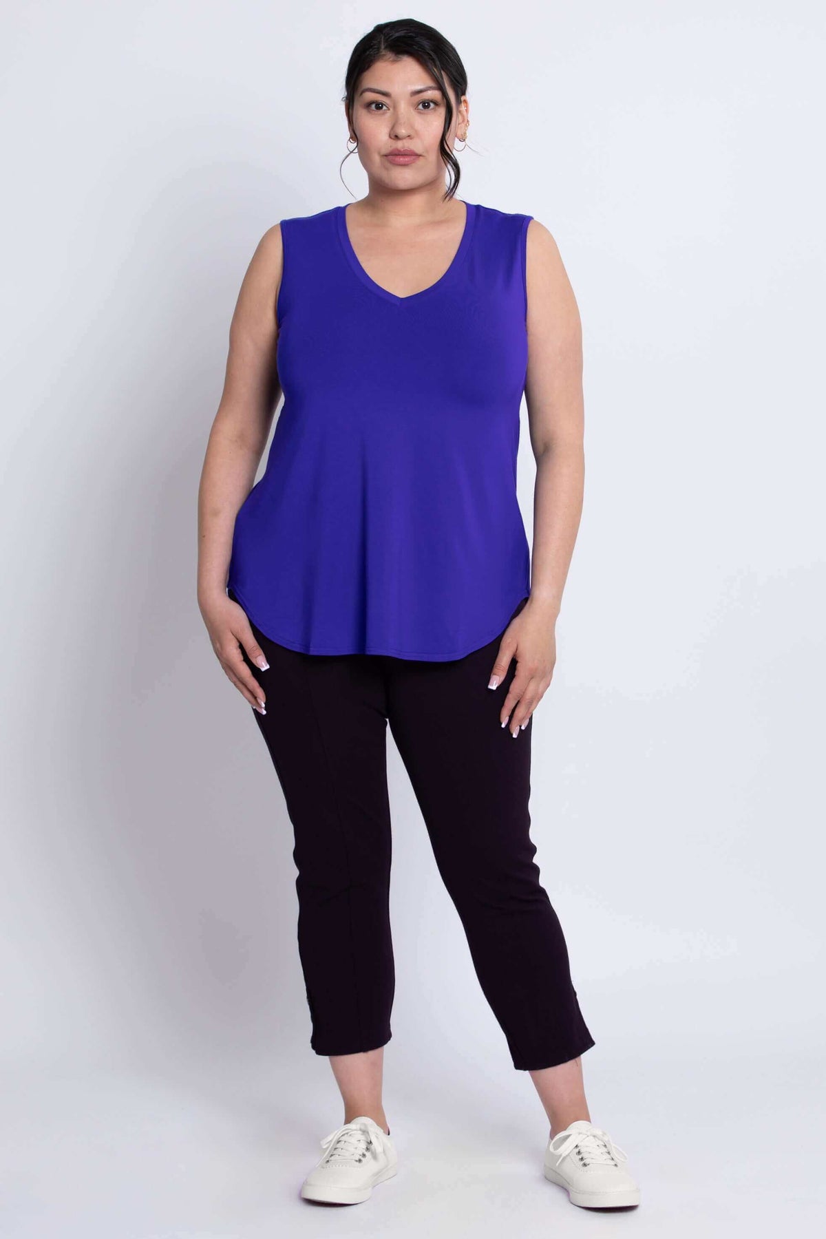 Full body front view of model in Jackie bamboo sleeveless top and black pants