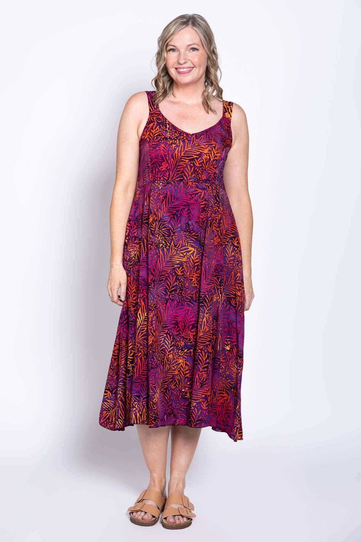 Full body front view of model in Shauna dress with leaf pattern, showing relaxed fit