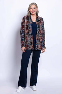 Full length shot of a woman wearing a multi plaid cotton button down jacket and dark navy pants.