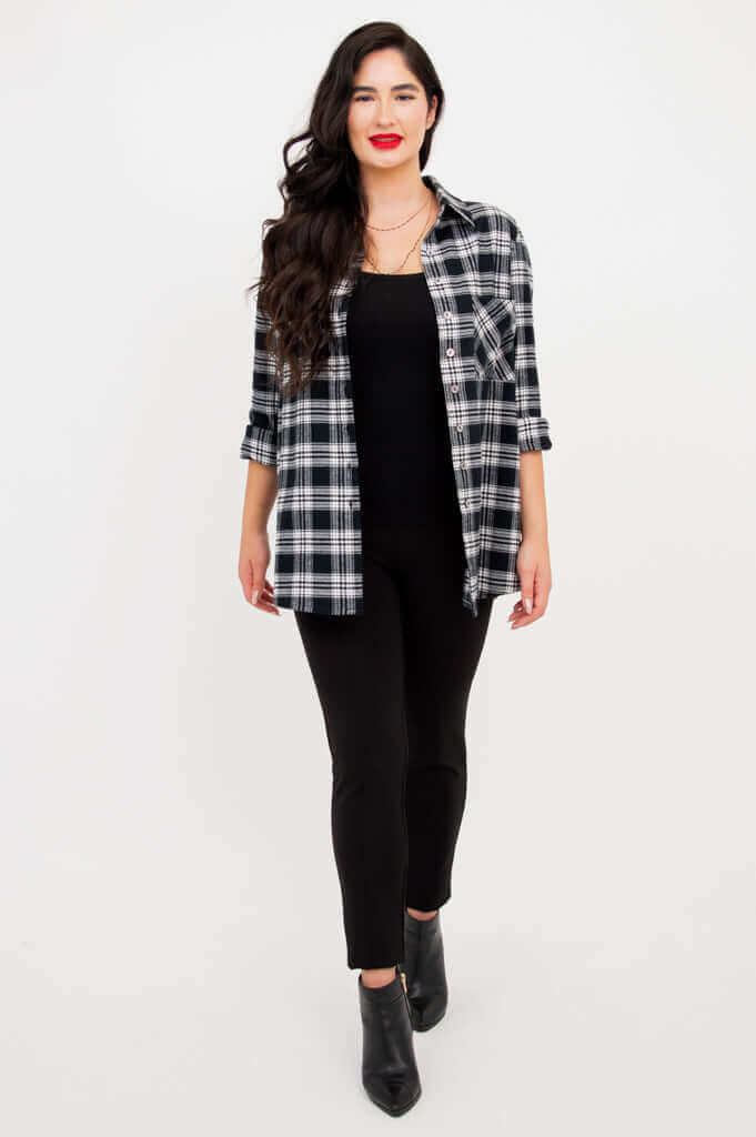 Full body view of model in Georgia plaid shirt, black tank, and leggings