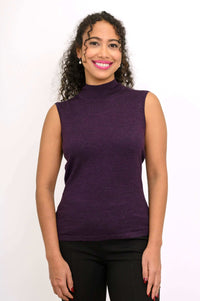 Woman facing forward in sleeveless purple Merino wool mock neck sweater