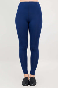 Full front view of Ruby leggings in deep blue on a model