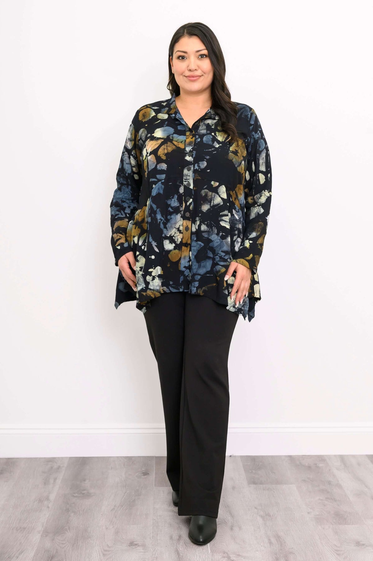 Full front view of model in Laney Blouse and black pants, standing