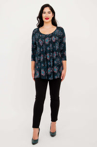 Full front view of Peyton Top in teal paisley print styled with black pants