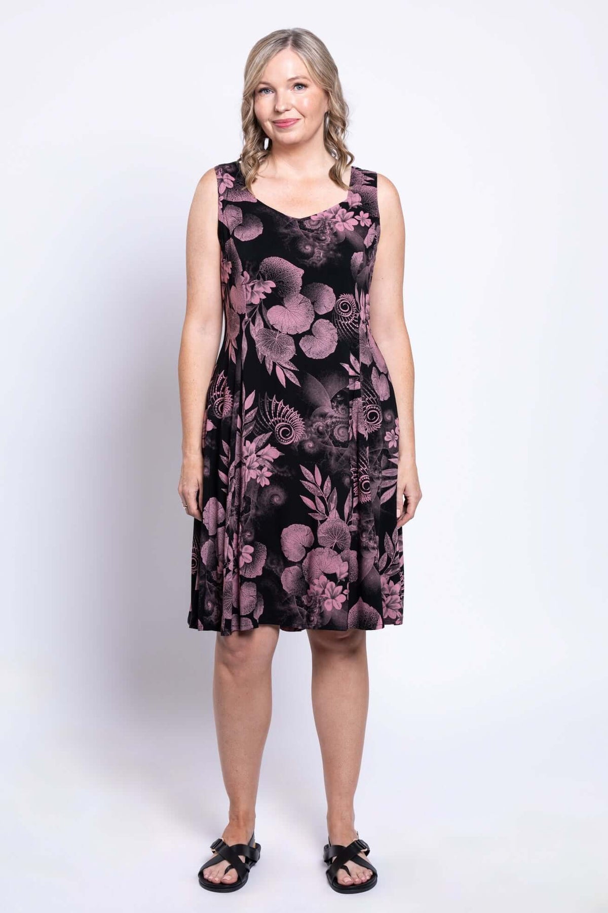 Full front view of Sweet Sara dress with abstract pink floral pattern