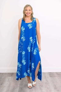 Full front view of model in blue floral square neck dress with side slit